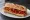 Sandwich aux Poivrons: an illustration of bell pepper, olive oil and garlic on baguette.