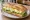 Sandwich aux Œufs: an illustration of egg, mayonnaise, butter, lettuce and more on baguette.