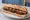 Sandwich Boudin-Pommes: an illustration of apple, butter and pepper on baguette.