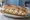 Sandwich Brandade: an illustration of potato, olive oil, garlic, parsley and more on baguette.