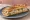 Sandwich Brandade de Morue: an illustration of potato, olive oil, garlic, parsley and more on baguette.