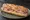 Sandwich Breton: an illustration of ham, butter and pepper on baguette.