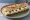 Sandwich Brocciu: an illustration of mint, olive oil and pepper on baguette.