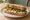 Sandwich Chèvre-Noix: an illustration of goat cheese, walnuts, honey, butter and more.