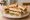 Sandwich Club: an illustration of turkey, egg, bacon, lettuce and more.