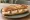 Sandwich Crottin de Chavignol: an illustration of butter, honey and walnuts on baguette.