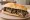 Sándwich de Asado: an illustration of beef and chimichurri on baguette.