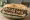 Sándwich de Ciervo: an illustration of onion and pepper on baguette.
