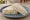 Sándwich de Miga de Pollo: an illustration of chicken, mayonnaise, butter and celery on white bread.