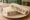 Sándwich de Miga de Roquefort: an illustration of walnuts and butter on white bread.