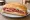 Sándwich de Salame: an illustration of salami, cheese and mayonnaise on baguette.