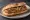 Sandwich Diots: an illustration of onion and garlic on baguette.