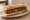 Sandwich Figatellu: an illustration of garlic and butter on baguette.