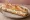 Sandwich Fromage Frais: an illustration of butter and scallion on baguette.