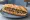 Sandwich Lentilles du Berry: an illustration of onion, parsley and butter on baguette.