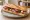 Sandwich Lonzu: an illustration of butter and pickle on baguette.