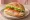 Sandwich me Galopoula: an illustration of turkey, lettuce, tomato, mayonnaise and more on bread.