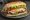 Sándwich Mendocino: an illustration of ham, cheese, tomato, lettuce and more on baguette.