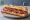 Sandwich Montpelliérain: an illustration of tomato, olive oil, garlic and butter on baguette.
