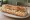 Sandwich Munster-Cumin: an illustration of cumin, butter and onion on baguette.