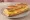 Sandwich Omelette: an illustration of egg, butter and pepper on baguette.