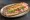 Sandwich Parisien: an illustration of ham, butter, lettuce, tomato and more on baguette.