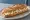 Sandwich Picodon: an illustration of honey, olive oil and pepper on baguette.