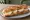 Sandwich Rigotte de Condrieu: an illustration of honey, olive oil and pepper on baguette.