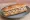 Sandwich Rillettes de Thon: an illustration of tuna, lemon, onion, parsley and more on baguette.