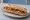 Sandwich Rillettes de Tours: an illustration of pork, pickle and pepper on baguette.