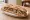 Sandwich Rillettes de Tours: an illustration of pork, pickle and pepper on baguette.