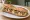 Sandwich Roquefort-Noix: an illustration of walnuts, butter and honey on baguette.