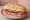 Sándwich Santafesino: an illustration of pork on baguette.