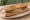 Sandwich Sarthois: an illustration of pickle on baguette.