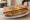 Sandwich Saucisson-Cornichons: an illustration of pickle and butter on baguette.