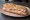 Sandwich SNCF: an illustration of ham, butter, chicken, tuna and more on baguette.