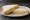 Sandwich Spread: an illustration of mayonnaise and butter on white bread.