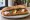 Sandwich Tomate-Mozzarella: an illustration of mozzarella, tomato, olive oil and basil on baguette.