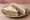 Sardine Sandwich: an illustration of butter, sardine and lemon on white bread.