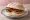 Sausage Bap: an illustration of butter, brown sauce and ketchup.