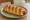 Sausage Roll (ソーセージロール): an illustration of the sandwich.