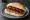 Sausage Sandwich: an illustration of butter, brown sauce and ketchup on white bread.