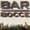 Rust-brown metal letters reading BAR BOCCE mounted on cream horizontal siding, with shrubs along the bottom edge.