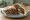 Sawda Sandwich (ساندويش سودا): an illustration of garlic, brown sauce, onion, lemon and more on pita.