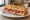 Schiacciata Fiorentina con Prosciutto: an illustration of prosciutto and olive oil.