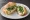 Schnittlauch Brötchen: an illustration of butter, cream cheese and scallion on kaiser roll.