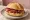 Schwarzwälder Schinken Brötchen: an illustration of ham and butter on kaiser roll.