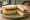 Scottish Cheddar Sandwich: an illustration of cheddar cheese, butter and chutney on white bread.