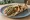 Seekh Kebab Naan Roll: an illustration of lamb, onion, cilantro, tzatziki and more on naan.