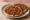 Sfeeha (ספיחה): an illustration of beef, onion and tomato.